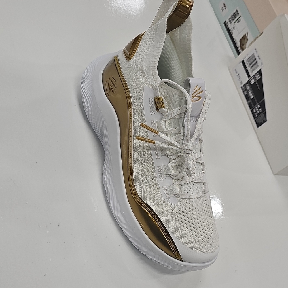 White and Gold Athletic Shoe